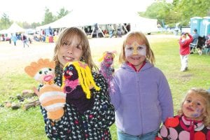 The activity tent for kids offered all kinds of fun activities. These young ladies had their faces painted and then made some delightful sock puppets.