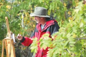 Hidden in the trees on The Point, Doug Berg of St. Croix, WI, would have made a good subject to paint.