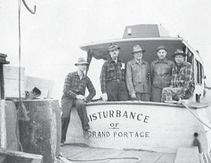 As the boating season winds down, the News-Herald thought it would be fun to look at a Lake Superior boat of days gone by. This photo is of the Disturbance in Grand Portage. The boat was known as Disturbance of Bayfield before it became a fishing and tour boat in Grand Portage. The photo is shared with us by Lee Oberg, formerly of Grand Portage, now living in Santa Cruz, California. It is not known who the men aboard the Disturbance are, but the man on the stern (back left) is Lee Oberg’s father, Captain Roy Oberg.