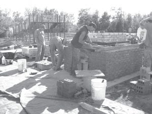 One of the many exciting improvements at the Birch Grove Community Center is the construction of a brick hearth oven. A celebration will be held at Birch Grove from 2 – 5 p.m. on Saturday, September 29 so the public can see the new outdoor classroom pavilion, the ice skating hockey rink, and the hearth oven. The folks who built the oven, pictured above, will be on hand to fire up the oven and bake some pizza.