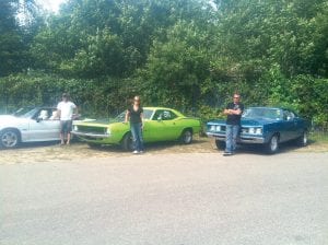 Three Grand Marais residents headed to the Brainerd International Raceway over Labor Day weekend for the Muscle Car Shoot Out. (L-R) Jessie Backstrom in a 1988 GT Mustang, Bev Wolke in a 1974 Barracuda and Rick Backstrom in a Dodge Super B.