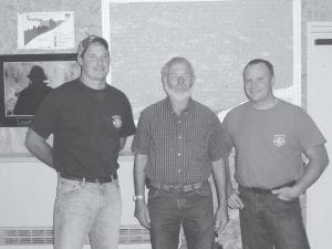 At the Maple Hill Community Fire Department annual meeting on Wednesday, September 12, the baton was passed from Fire Chief Ed Hedstrom to new Chief Kent Anderson. The chiefs (L-R) Fire Chief Kent Anderson, retiring Chief Ed Hedstrom and Assistant Chief Brian Olson.