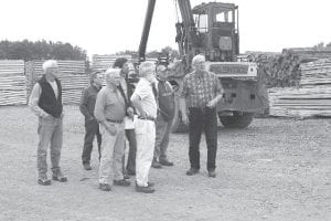 Howard Hedstrom takes members of the Biomass Steering Committee on a tour of Hedstrom’s mill on September 12, showing the production and utilization of the wood chips, a by-product of the milling operation, as it relates to Hedstrom Lumber Company’s use of biomass. Committee members (L-R) John Bottger, Gary Atwood, Paul Nelson, George Wilkes, Tim Kennedy, Mike Garey, and Howard Hedstrom.