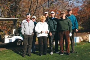 Above: Andy Smith, Paul Nelson and Sue Hansen are shown here with the over 60 Elite Division champions. Standing next to Sue are Gene Utecht, Russ Baker, Tom Wentworth and Mike Jerabek. Smith, Nelson and Hansen were part of a larger team of volunteers who helped make the fundraiser a huge success.