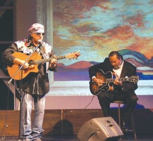 The Arrowhead Center for the Arts was crowded with art and music enthusiasts who gathered on Saturday, October 6 for a wonderful evening of entertainment for a great cause. Proceeds from the evening will be used toward restoration of Dawn and Sea, an oil painting by Grand Portage artist George Morrison donated to Cook County High School in 1952. Award-winning singer-songwriter Keith Secola and George Morrison’s son, jazz guitarist Briand Morrison, were among the performers on the ACA stage.