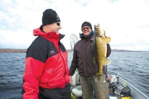 Tails from the Trail columnist Cory Christianson fishes in all kinds of weather, but even he said it was probably too cold for fishing last week. However, his hardy customer Ed hung in there and was rewarded with this catch, a 30-inch walleye weighing 12.2 pounds.