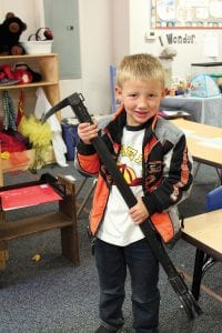 On Thursday, October 11, firefighters from the West End fire departments visited Birch Grove Community School. Firefighter (and former Birch Grove student) Daniel Nelson helped kids take a turn on the fire hose—first Riley (left), then Masen (below). All of the students had great questions for the firefighters.