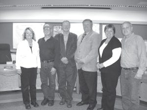 State Sen. Tom Bakk and State Rep. David Dill visited with the county board on October 23, answering questions and discussing issues that affect Cook County. (L-R) Commissioner Jan Hall, Commissioner Fritz Sobanja, Rep. Dill, Sen. Bakk, Commissioner Sue Hakes, and Commissioner Bruce Martinson.