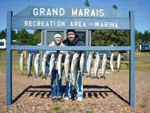 Above: Shayla and Nicke Fere were visiting friends in Grand Marais in September and they caught their limit of lake trout plus seven chinooks and coho salmon. They were fishing with Captain Jerry Skarupa aboard Secret Lures on Saturday, September 15.