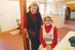 The Cross River Heritage Center smelled like Christmas on Saturday, November 17 as members of the Schroeder Area Historical Society made lefse and krumkake. Above: Museum Director Suzan From shows her lefse-making skills. Above right: Leona Sherer (left), who has been “Mrs. Claus” for many years, passed that honor on to Dorie Spence this year. The ladies offered a festive greeting to all who visited the heritage center.