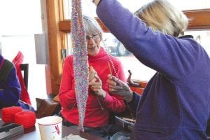 Members of the Northwoods Fiber Guild frequently gather for coffee at Java Moose, bringing along fiber art projects to work on and to share—like this lovely scarf. Last week the conversation included planning for the December 1 Holiday Sale and Open House at the Grand Marais Art Colony.