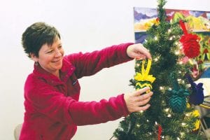 There were dozen of vendors and crafters at the Holiday Sale at the Cook County Community Center on Saturday, November 24. It looked and smelled like Christmas in the community center and in the 4H log building. Marla Huber was one of the crafters with her unique pinecone Christmas ornaments.