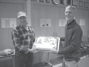 County Commissioners Fritz Sobanja (left) and Jim Johnson were honored for their service to Cook County with a reception at the courthouse on December 18. They both served two fouryear terms and had very positive things to say about their experiences on the county board. December 18 was their last regular meeting while still in office.