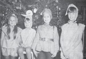 There were plenty of elves about during the Grand Marais Elementary School Christmas choral program at the school Dec. 15, 1970. Some of the children taking part were, from left, Susan Tousley, Leona Wilson, Michelle Thompson and Michelle Oullette. Not in the picture were Susan Bargabus, Michelle Hanson, Jan Hess, Randi Johnson, Kathleen Koss and Lee Ann McElevey. In all, 375 children took part in the program, which was directed by Irene Thompson.