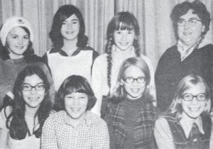 Sixth-grade Camp Fire Girls visited the Photo Art Shop to hear from M.J. Humphrey what’s involved when a picture is taken. He showed them his darkroom and explained about developing. Then he took their picture, which appeared in the Dec. 17, 1970 issue of the Cook County News-Herald. Front row, from left, are Sue Allard, JoAnn Ziesmer, Becky Bystrom and Debbie Toftey. In the second row, from left, are Valita Bockovich, Sally Moores, Jenny Tousley and the adult leader, Mrs. Thomas Allard.