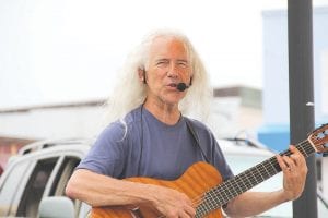 Local musician Michael Monroe is a fixture at local festivals. Fans will be happy to hear that the popular performer has received a grant to develop a DVD showcasing the log cabin concert series that he and his life and business partner Deb Mueller host at their Pike Lake home.