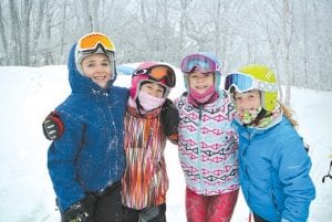 Girlfriends Reilly Wahlers, Team Duluth’s Jewel Stone, Sela Backstrom and Halle Lamb hanging out at the start.