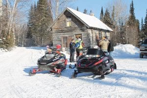 The Grand Portage Trail Riders were up bright and early in subzero temperatures on Saturday, February 2, firing up the woodstove in the shelter at Grand Portage Trail Center and starting a bonfire where riders in the 10th annual Snowarama for Easter could warm up and have a hotdog or S’mores as they passed by.