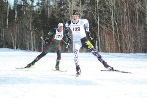 The Sawtooth International Cross Country Ski Race on Saturday, February 16, saw some exciting competition. The winners in the 18.7K Freestyle race crossed the finish line with a difference of only 7/10ths of a second. Finishing first was No. 138 Dudley Coulter of Thunder Bay. Second was No. 124 Adam Swank of Duluth, who had already finished second in the 9.7K Classic race, earning the top combined position for the day. See results on page B5.