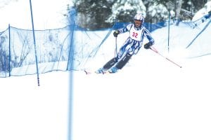 Luke Fenwick shows the fine form that helped him place 38th at the State Meet. Luke was the second boy to score for the CCHS team at State.