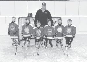 Above: The mighty M1s! (L-R) Elijah Swanson, Katie Carpenter, Brody Bronikowski, Landon Sheils, Wyatt Clay, Jacob Carpenter. Back: Coach Nate Sheils.