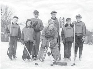 As winter fades, we thought it might be fun to see a winter scene from years gone by. The Cook County Historical Society has this photo in its archives, annotated simply “Hockey – 1951.” Do you know who these hockey players in Grand Marais High School jerseys are? How about the coaches? And where are they playing? If you know, let us know!