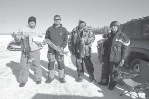 There was a great turnout for the Cook County Ridge Riders Snowmobile Club Trout Derby on Sunday, March 3. Some very nice lake trout were entered in the competition. The winners were(L-R)John Konig was first with a 6 pound, 9 ounce trout, winning $500 cash. Cory Christianson was third with a 4 pound, 13 ounce trout. Cory won an ice fishing pole and gaff. Jay “Gyro”Carlson was second with a 5 pound, 8 ounce laker, winning a Strikemaster ice auger. John Anderson was fourth with a 4 pound, 12 ounce trout,winning a gift certificate to Grand Marais Liquor Store. There were many other great prizes and nice fish caught—and everyone had a great time on the ice!