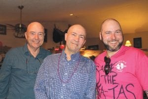 Left: On Friday night these three local business owners—Bruce Kerfoot of Gunflint Lodge, Scott Harrison of Lutsen Resort and Forrest Parson of Hungry Jack Lodge—put their heads on the line to raise money for the fight against breast cancer. Together the men raised $6,000 from friends who wanted to see them lose their hair. The shaving took place in front of the uproarious crowd at Windigo Resort. Below left: There is a serious reason for all the silliness and that is to raise money for the National Breast Cancer Foundation—and to honor survivors and those in the midst of their struggle, like Pam Taylor of Grand Marais. Pam is a Cook County High School teacher and athletic director who was diagnosed with breast cancer earlier this year. Everyone was delighted that Pam could make it to a little bit of Mush for a Cure, where she helped hand out awards for most pledges raised, most money raised and more. (LR) Mary Black, Pam Taylor and Sue Prom. Mary Black and Sue Prom are organizers of the event which raised approximately $34,000 to fight breast cancer.