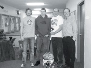 There was a great turnout for the Charles J. Futterer Sr. Memorial Open Bonspiel with many members of the Futterer family joining the fun. Above: Logan, Ian, Chuck and Bruce Futterer.