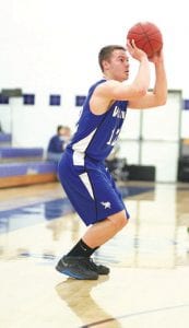 Top: Colin Everson made two late baskets to pull the team to within 2 points, but the team fell just short in their march to move on in the Section 7A play-offs. Right: Kale Boomer’s last game in a Vikings' uniform was memorable. Against Fond du Lac he scored 16 points, grabbed 11 boards and had 5 assists to go along with his always-tough defense. Above: Peter Warren faked this shot and passed off. Peter didn’t score a lot of points, but he was a demon on defense and a tough rebounder.