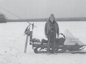 Ed Hedstrom loves to ice fish. But he’s also very fond of trolling. Apparently he has found a way to do both at the same time. This photo demonstrates his ice trolling system. Don’t forget the tartar sauce when you stop by Ed’s house to say hi.