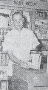 This photo of druggist John McElevey appeared in the Cook County News-Herald on April 18, 1963 as the Peterson Drug Store moved to its new location in the Arrowhead Hotel. Renovation of the hotel space had been taking place over the winter, with Clark McElevey in charge of the work. Druggist John McElevey told the News-Herald that the new space would give the drug store about 70 percent more space. Besides McElevey, the regular employees were Mrs. Jeff Halverson and Mrs. Bernard Skoog. Part time workers were Beverly Olsen and the former storeowner A.L.E. Peterson.