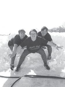 Team “Holli’s Hope” prepares to take a dip in Pleasant Lake in St. Cloud on February 16, 2013. The team members—Bryann Bockovich, Miriam Howton and Linda McClellan— raised almost $2,000 for Special Olympics. And then they jumped in the ice cold lake!