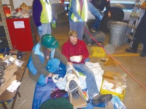 The final test for the CERT students was a simulated roof collapse that required a search and rescue operation, triage, medical care, fire suppression and extrication response.