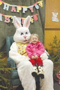 The Cook County KidsPlus Easter Egg Hunt on Saturday, March 30, 2013 had lots of fun things for kids to do, such as ice skating, arts and crafts, a cake walk and visiting with a giant Easter Bunny. Little Payton Quaife was all smiles when it was her turn to say hi to the bunny.