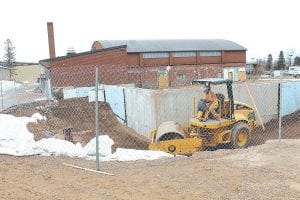 Despite the continuing winter-like weather, outdoor construction continues on the Cook County Family YMCA facility. The county board continues to make cost-related decisions in order to keep the project within the budget it has set. Its architecture and engineering firm, JLG Architects, is considering litigation against the county related to reimbursement issues.