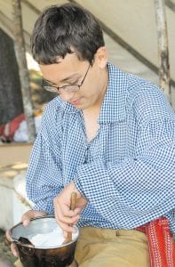 Although budget cuts have reduced the hours that the Grand Portage National Monument will be open, there will still be many opportunities to learn about life in Grand Portage 200 years ago. Visitors will still have the chance to talk to historical interpreters like this young voyageur.