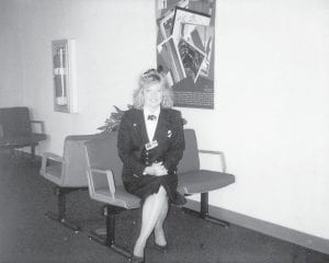 A lifelong dream came true for Laurie Bradley when she became a Pan Am Airlines flight attendant in 1989. She flew all over the world, enjoying her interactions with passengers, meeting a few famous people, and seeing the sights in cities such as London and Paris. Above: Airline personnel were required to dress up at all times when flying, whether as passenger or crew, although the uniforms were only required when they were on the job. This is Bradley in uniform. Left: While working for Pan Am, Bradley lived in New York City and took this photo of the Twin Towers that would later come crashing down on September 11, 2001.