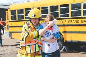 Emergency responders were put to the test on Saturday, April 27 when a liquid transport truck crashed into a school bus. Fortunately the injuries to a dozen schoolchildren and the bus driver were simulated, however participants in the exercise, which was part of the Cook County Emergency Services Conference, agreed it was quite realistic. The “bus crash” was part of a myriad of training on Friday and Saturday.