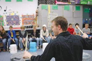 Mark Powers, a percussion artist, educator and world traveler, will visit Cook County on Friday and Saturday, May 17 – 18. On Friday he will work with students at Great Expectations School in the classroom in a “Junk Jam” workshop, demonstrating how everyday objects can become musical instruments.