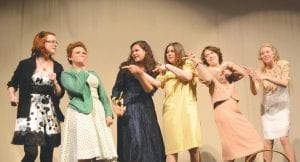 The Grand Marais Playhouse “Commitment to Excellence in Theater Arts” 2013 awards were presented after the last performance of First Baptist of Ivy Gap. Award recipients (L-R) Jordyn Kirk, Michaela Peterson, Sarah Larsen, Adrianna Berglund, Mara MacDonell and Cailan Carpenter mimic the characters of Ivy Gap in an adaptation of one of the play’s songs. They sang, danced and laughed their way through We’ll Be Leaving Grand Marais Sometime Soon!