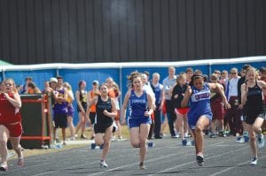 Seventh-grader Wellesley Howard- Larsen displays her sprinting form in a track meet held last week in Virginia. The Vikings boys’ and girls’ team placed in the top half of teams entered into the meet.