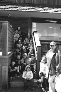 The kindergarten and first grade class of Oshki Ogimaag Community School took a field trip on Thursday, May 16, visiting a variety of businesses. One of their stops was at the Cook County News-Herald where they learned a little bit about the production of the newspaper. They were all given a worksheet with the News-Herald flag (the banner across the front) to use to make their own newspaper.