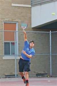 Far left: Senior Justin Goldstein displayed his powerful serve in a recent match. Above: Pete Summers, a 9th grader, got set to deliver a forehand return. Left: Isak Terrill, just a 7th grader, has played doubles and even filled in at No. 4 singles for the varsity this year. The boys' team wrapped up its season on Wednesday, May 22 at Sections. Sophomore Lars Scannell advanced to the state tennis meet. More next week.