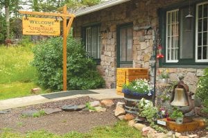 A sign that summer is coming to the Gunflint Trail—the Chik-Wauk Museum and Nature Center opens May 25. This is the fourth season for the museum, operated by the Gunflint Trail Historical Society.