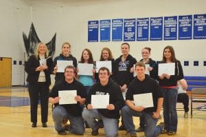 Joan Gardner-Goodno of the Lloyd K. Johnson Foundation presented full scholarships for Lake Superior College to nine Cook County High School graduates. (L-R) ZachTaylor, Mike Taylor, Clay Johnson. (L-R, back) Gardner-Goodno, Jade Wolke, Deedra Mongan, Anna Green, Stephanie Fenstad-Lashinski, Kayla Bronikowski, Adrianna Berglund.