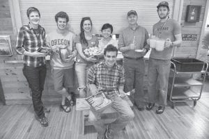 YMCA Camp Menogyn held its annual community pancake breakfast on Sunday, May 26. Camp Menogyn Program Director Mo Mayo said about 200 people enjoyed pancakes and fixings. Staff members prepared the delicious breakfast. (L-R, back) Mo Mayo, Will Angevine, Rachel Hedlund, Mei Schulte, Doug Nethercut, Danny Hupp. Seated with pancakes is David Lilien.