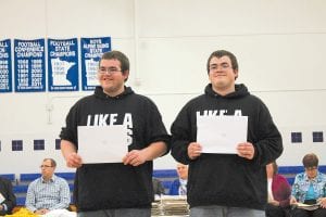 Receiving the Grand Marais Public Utility Commission scholarship at the May 20 Cook County High School scholarship awards program were Zach Taylor and Mike Taylor. The graduates earned the scholarship based on essays entered in a contest. Also winning a scholarship, but not pictured was Sterling Anderson. Sterling received $200; Zach Taylor received $300; and Mike Taylor Jr. received $500. Mike’s winning essay on municipal utilities is below.