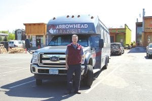 Longtime Arrowhead Transit driver Mark Quello stands in front of the new bus he will use to transport people throughout the county. Arrowhead Transit will show off its new bus and its staff will host an open house on Tuesday, June 25 at the Cook County Senior Center from 10 a.m. to 2 p.m.