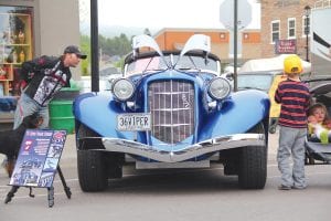 Just how fast would this car go? That might have been the question on this young man’s mind as he looked over the 1936 Auburn Boattail Speedster owned by Brad and Joanie Videen of Cambridge, Minnesota. A big fan favorite at the 2013 Annual Car Classic Show held Saturday, June 15 in downtown Grand Marais, this car was one of nearly 50 vehicles on display. The Auburn Boat tail Speedster was selected for the Photographer Bruce Johnson Choice award. Read more about this event on page A3.